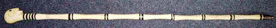 Lot 282 - A 19th Century Marine Ivory and Baleen Spirit Stick, possibly Inuit, the pommel carved as the...