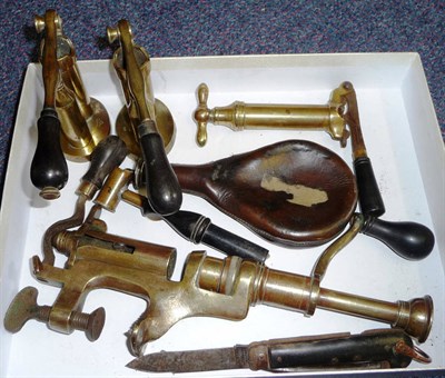 Lot 313 - Four 19th Century Brass Cartridge Reloading Tools by William Bartram & Co., Sheffield,...