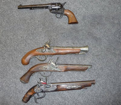 Lot 373 - A Replica of a Cavalry "Peacemaker" Revolver;  and three replica miquelet pistols. (4)