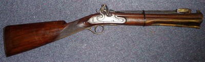 Lot 406 - A 19th Century Flintlock Blunderbuss by Spencer, the 35.5cm damascus barrels with crisp...