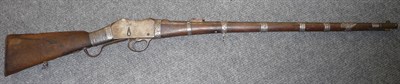 Lot 411 - A 19th Century Martini Action Rifle, the 71cm steel barrel with silver bead foresight and...