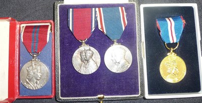 Lot 10 - A Jubilee Medal 1935 and Coronation Medal 1937, mounted for wear, cased; a Coronation Medal...