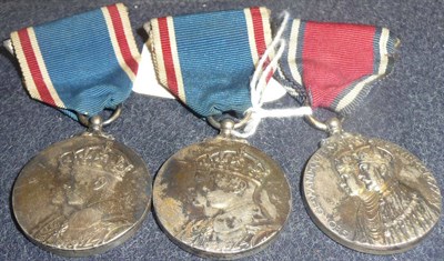 Lot 23 - A Jubilee Medal 1935, with breast ribbon; two Coronation Medals 1937, with breast ribbons. (3)