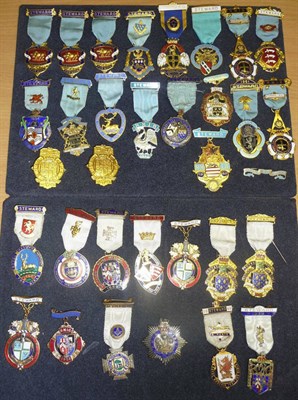 Lot 54 - A Collection of Enamelled Masonic Charity Jewels, including:-  two silver gilt and seventeen...