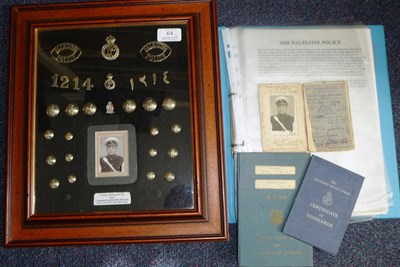 Lot 64 - A Framed and Glazed Display of White Metal Insignia to the Palestine Police, with a portrait...