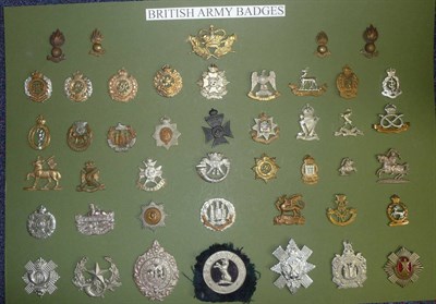 Lot 65 - A Collection of Approximately One Hundred and Eighty Five Cap Badges and Shoulder Titles, in brass