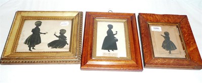 Lot 1086 - Attributed to Augustin Edouart (1789-1861): A Silhouette Cutout Standing Portrait of a Young Woman