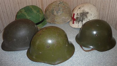 Lot 121 - A World War II German Bulgaria Foreign Volunteer Helmet, in olive green, wtih leather liner and...