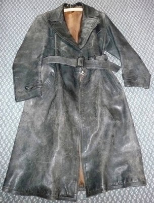 Lot 125 - A German Officer's Black Leather Trench Coat, with rever collar, stitched back yoke, waist...