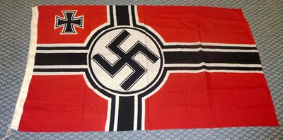 Lot 140 - A German Third Reich Battle Flag, of printed linen, the hoist hem stencilled with size 80 X...