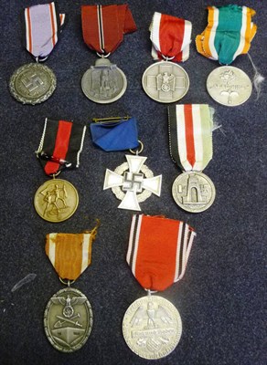 Lot 147 - A Collection of Nine German Third Reich Medals, comprising German Defence Medal; Winter Campaign in