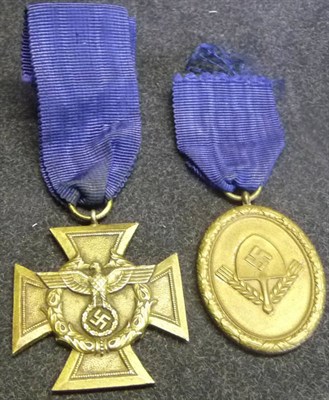 Lot 148 - A German Third Reich Water Customs Police Long Service Cross, with blue ribbon; an RAD Long Service