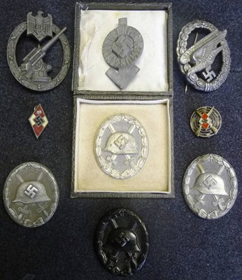 Lot 157 - Nine German Third Reich Badges, comprising:- a Luftwaffe Parachutist's Badge, stamped B&NL;...