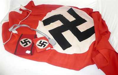 Lot 165 - A German Third Reich National Flag, with printed swastika and machine stitched hoist, 137cm by...