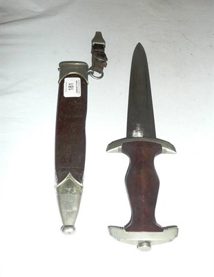 Lot 181 - A German Third Reich SA Dagger, the double edge steel blade etched "Alles fur Deutschland", no...