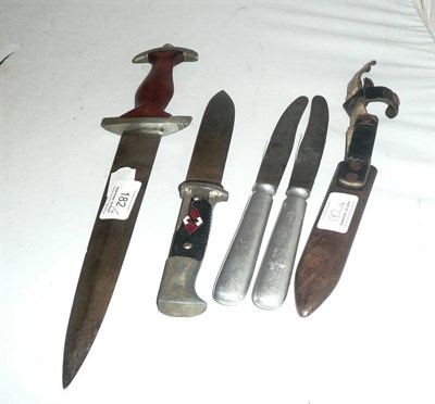 Lot 182 - A German Third Reich SA Dagger, the double edge steel blade etched "Alles fur Deutschland" and with