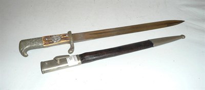 Lot 187 - A German Third Reich Police Parade Dagger, the single edge fullered steel blade with maker's...