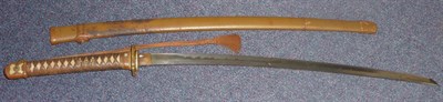 Lot 193 - An 18th Century Japanese Katana with Shin-gunto Mounts, the 68cm steel blade with billowing...