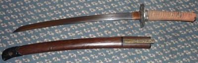 Lot 202 - A Mid-18th Century Japanese Wakizashi, the 39cm unsigned steel blade with delamination marks,...