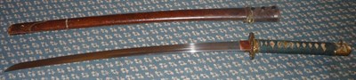 Lot 206 - A Japanese Second World War Army Officer's Katana, the 63cm steel blade with one piece copper...