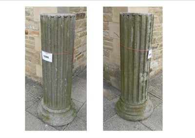 Lot 1099 - A Pair of 19th Century Granite Columns and Campana Cast Urns, 160cm overall