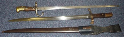 Lot 231 - A Portuguese Kropatschek Model 1885 Sword Bayonet, the fullered steel blade engraved Steyr 1886...