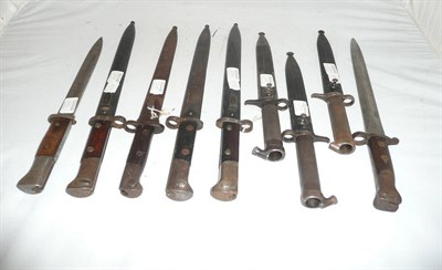 Lot 265 - A British Pattern 1888 MkI, Type 2 "Lee-Metford" Bayonet, lacks scabbard; three Swedish 1896...