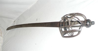 Lot 271 - An 18th Century Three Quarter Basket Hilt Cavalry Sword, the 79cm slightly curved single edge steel