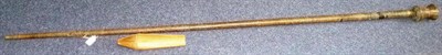 Lot 276 - A South American Wood Blowpipe, the cylindrical haft bound with bark terminating in the wood...