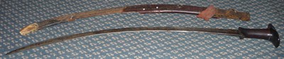 Lot 282 - A 19th Century Ethiopian Sword, the 77cm single edge curved steel blade with Kofgari type...