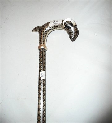 Lot 292 - An Indian Steel Walking Stick, with ram's head handle, the tapering cylindrical haft unscrewing...