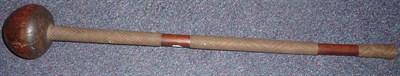 Lot 299 - A Zulu Knobkerrie, with large onion shape head, the tapered haft bound with bands of woven...