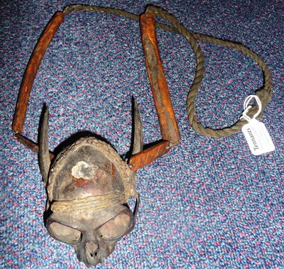 Lot 305 - A 19th Century Indonesian Witch Doctor's Monkey Skull Pendant Necklace, the skull lacking its lower