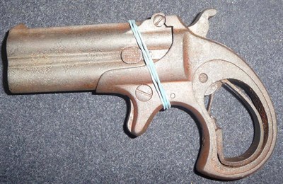 Lot 390 - A Remington Rimfire Double Barrel Derringer, the 7.5cm over and under barrels stamped...