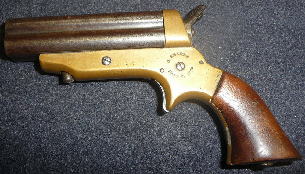 Lot 394 - A C. Sharps Patent 1859 Four Barrel Derringer, the 7.5cm steel barrels sliding forward for loading