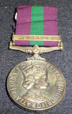 Lot 7 - A General Service Medal 1918-62, with clasp CYPRUS, awarded to 587402 CPL.D.BROWN. R.A.F.