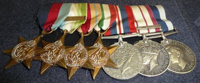 Lot 27 - A Second World War Naval Long Service Group of Seven Medals, awarded to KX.89092....