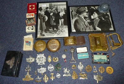 Lot 55 - A Collection of Second World War Memorabilia, comprising twenty three cap and glengarry badges,...