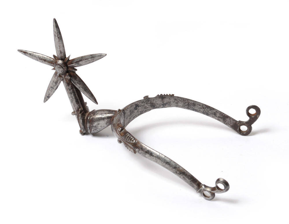 Lot 98 - A 17th Century English Civil War Steel Rowel Spur, the star shape rowel of five bevelled points...