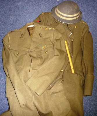 Lot 100 - A Second World War No.2 Tunic and Greatcoat, to a Captain of the Royal Engineers, with bamboo...