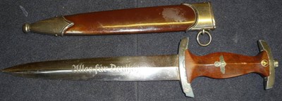 Lot 123 - A German Third Reich SA Dagger, the double edge steel blade etched "Alles fur Deutschland", RZM...