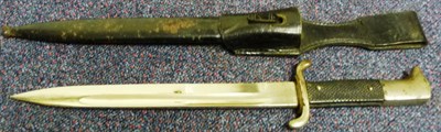 Lot 125 - A German Third Reich Parade Bayonet, the single edge fullered steel blade stamped ALCOSO,...