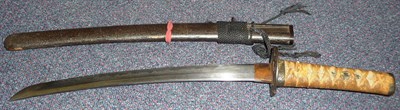 Lot 134 - An 18th Century Japanese Wakizashi, the 33cm steel blade with wavy hamon, signed on the tang,...