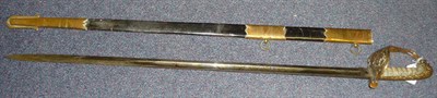 Lot 143 - A Royal Naval Reserve Sword, the 80cm single edge fullered steel blade etched with crowned RNR over