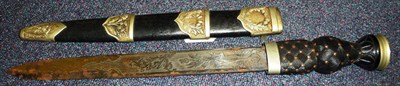 Lot 155 - A Scottish Dirk, the 30cm single edge steel blade etched with thistles, the ebonised grip with...