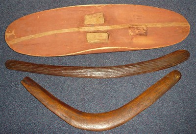 Lot 223 - A Central Australian Fire-Making Shield, in soft wood, of slightly curved oblong form, covered...