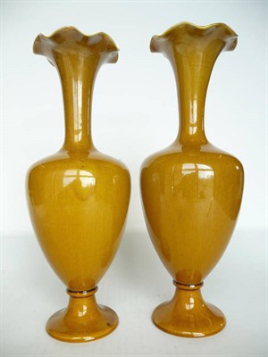 Lot 1144 - A Pair of Linthorpe Pottery Vases, shape No.1638, with frilly rims, mustard glaze, impressed...