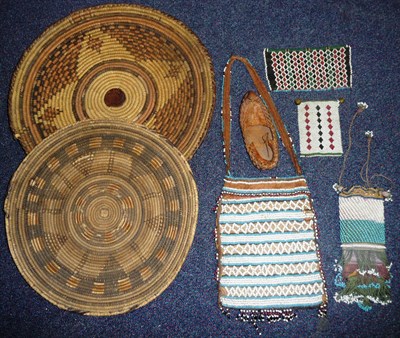 Lot 242 - A Native Beadwork Bag, possibly North American Indian, worked with horizontal bands of open...