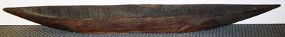 Lot 247 - A Papua New Guinea 'Spirit' Boat, carved from a solid hardwood trunk, with pointed prow and...