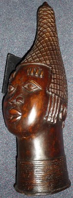 Lot 264 - A Benin, Nigeria Bronze Queen Mother's Head, with conical diapered headdress and ringed neck.53.5cm